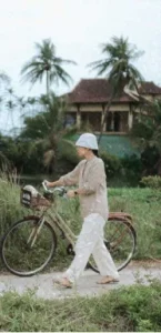 Woman walking with bicycle