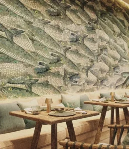 A restaurant with a large mural of fish on the wall, adding a vibrant and aquatic touch to the dining ambiance.