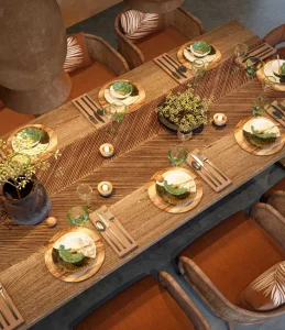 Beautiful dining table with comfortable chairs and stunning view.